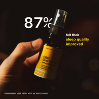 CBD Oral Spray bottle held by a hand with text about sleep quality improvement on a dark background
