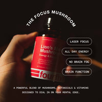 Bottle of Lion's Mane Mushroom supplement held by a hand with promotional text on a dark background.
