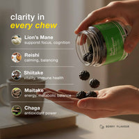 Hand pouring black mushrooms from a jar with text on benefits and ingredients.